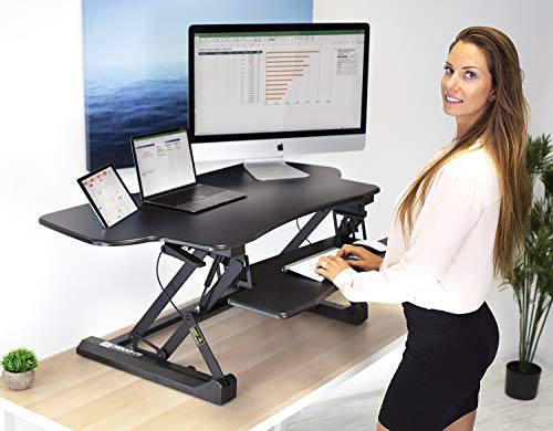 Mount-It! Height Adjustable Standing Desk Converter | 48 Wide Tabletop Sit Stand Desk Riser with Gas Spring | Stand Up Computer Workstation Fits Dual Monitors | Black | MI-7925